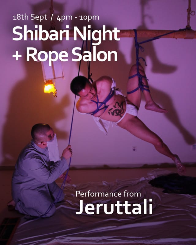 JerutTali's rope performance, a suspended figure above a kneeling rigger.